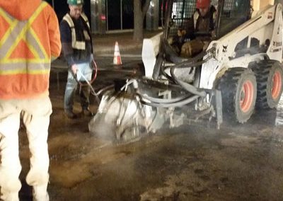 Repairing Utility Cuts At Night In Downtown Saskatoon
